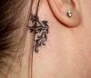 tribal phoenix tattoo on back of ear